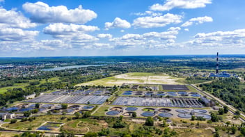 Industrial wastewater treatment plant handling contaminated process water from chemical production, illustrating the challenge of disposal versus value recovery.